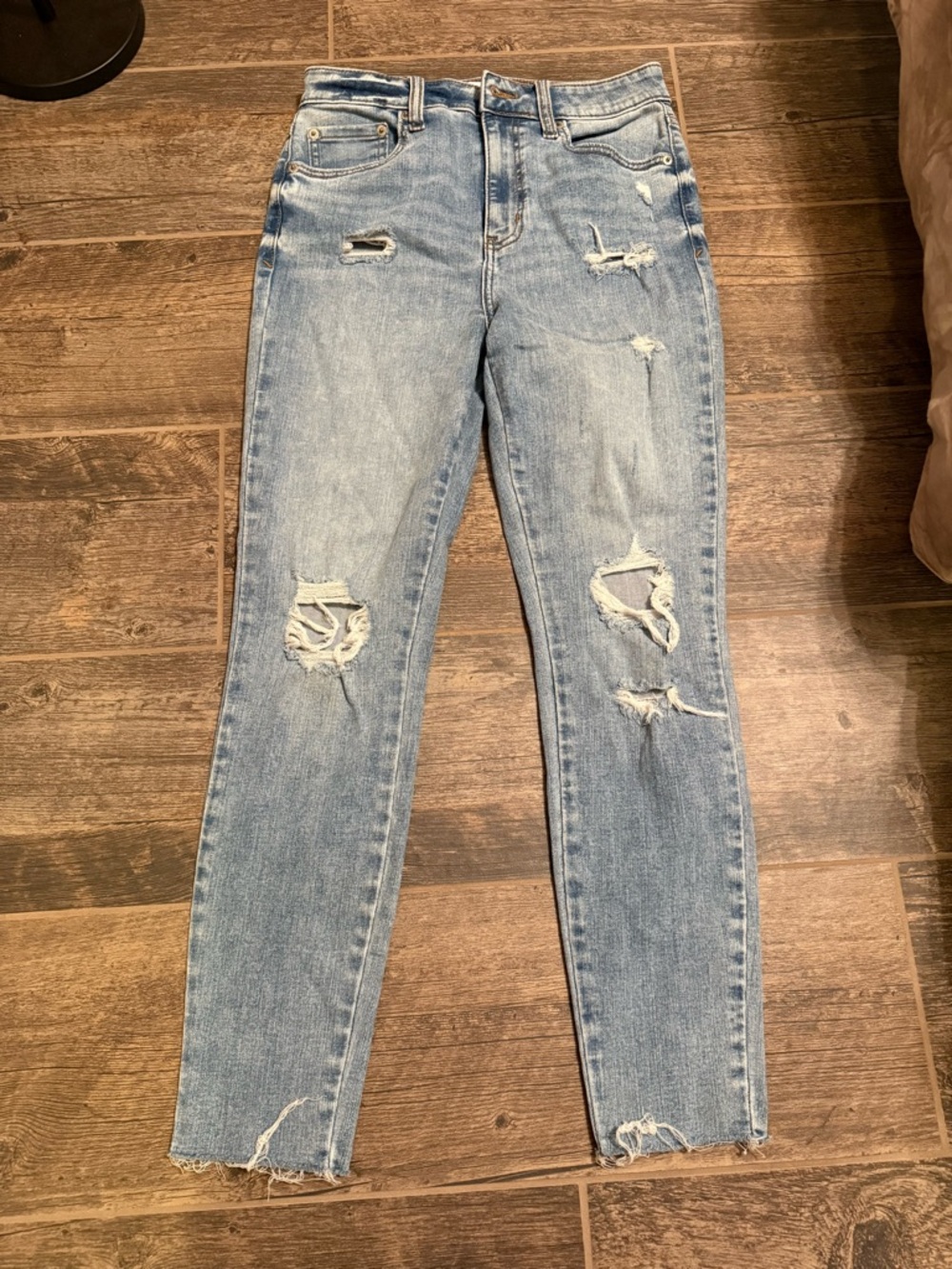 Distressed Light Blue Skinny Jeans - High Rise